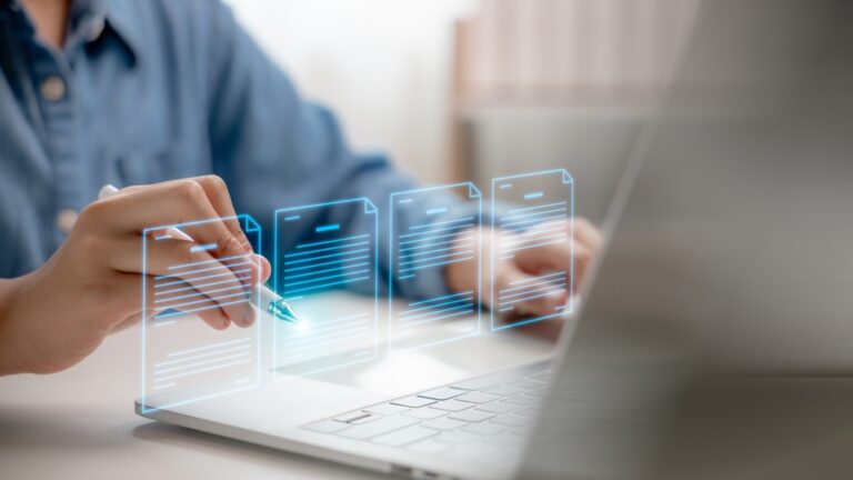 Hand,Holding,Pen,Interacting,With,Digital,Documents,On,A,Virtual